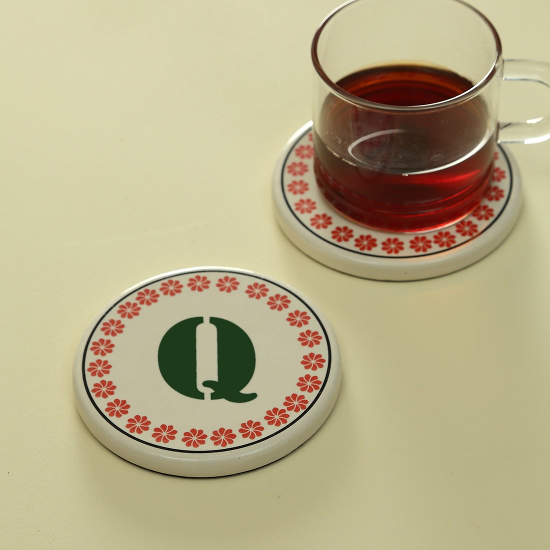 Monogram Q coaster