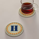 Monogram H coaster